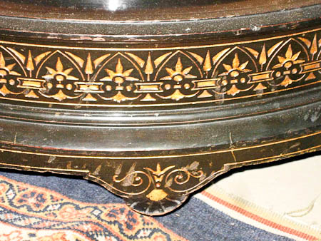 Detail of a Herter Brothers ebonized credenza with gilt-incised decoration